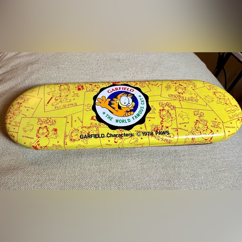 Vintage Garfield Yellow Comic Print Pencil Case with contents and glue.